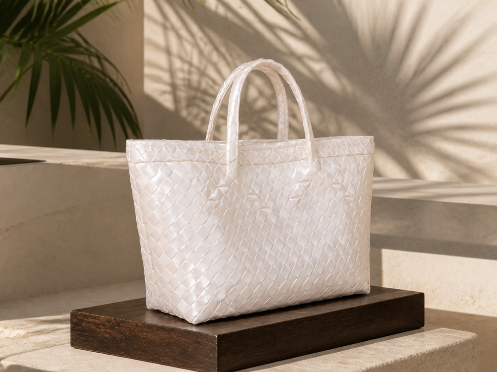 Lakbay Perlas pearl-white handwoven tote in a contemporary tropical interior