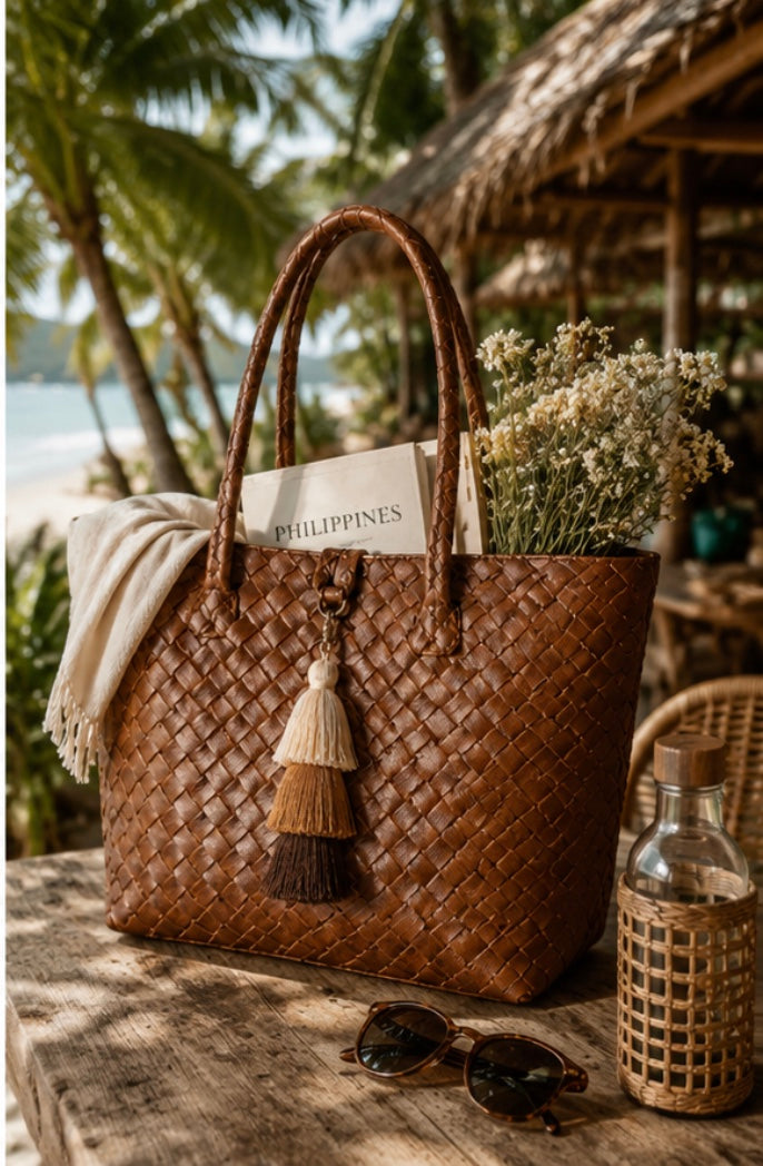 A woven Isa Bayong bag packed for a day by the water