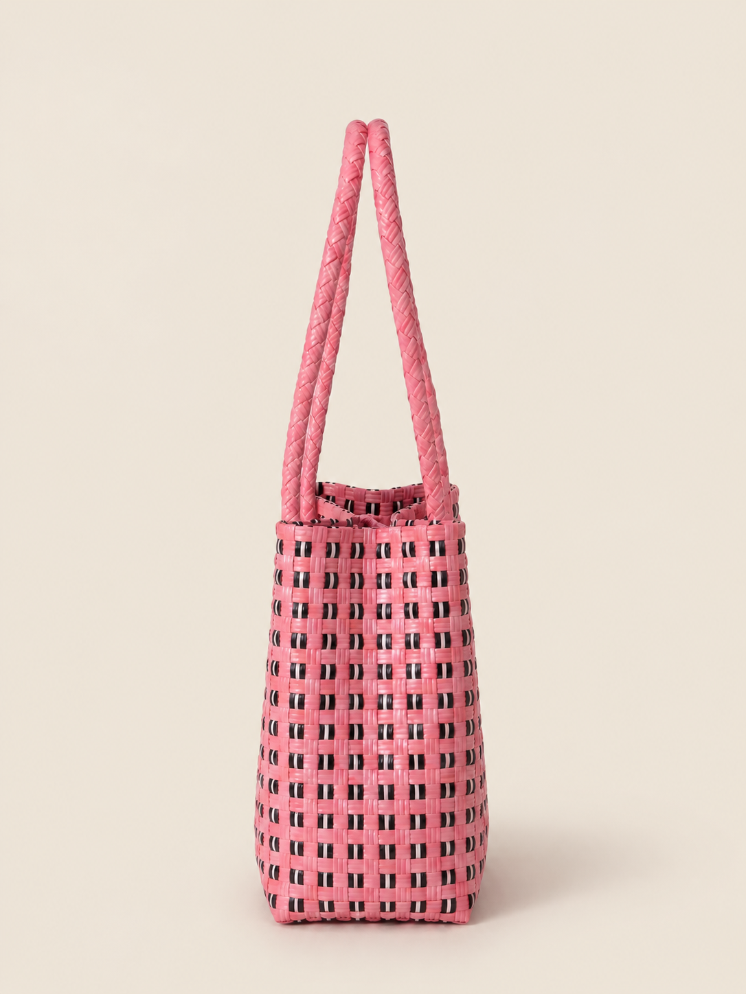 Habi Rosa recycled-polypropylene structured bayong tote, side view