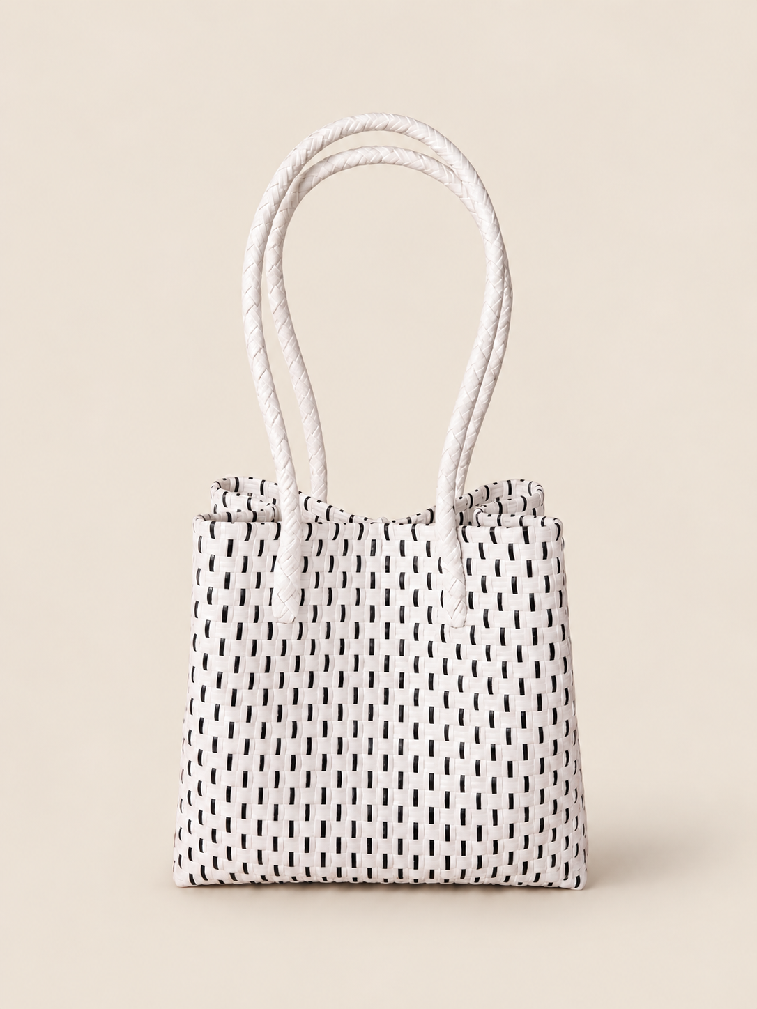 Habi Tinta recycled-polypropylene structured bayong tote, back view