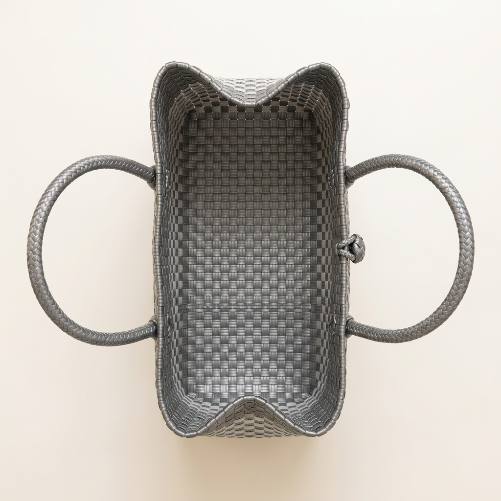 Aerial top-down view of silver-gray and white woven bayong tote