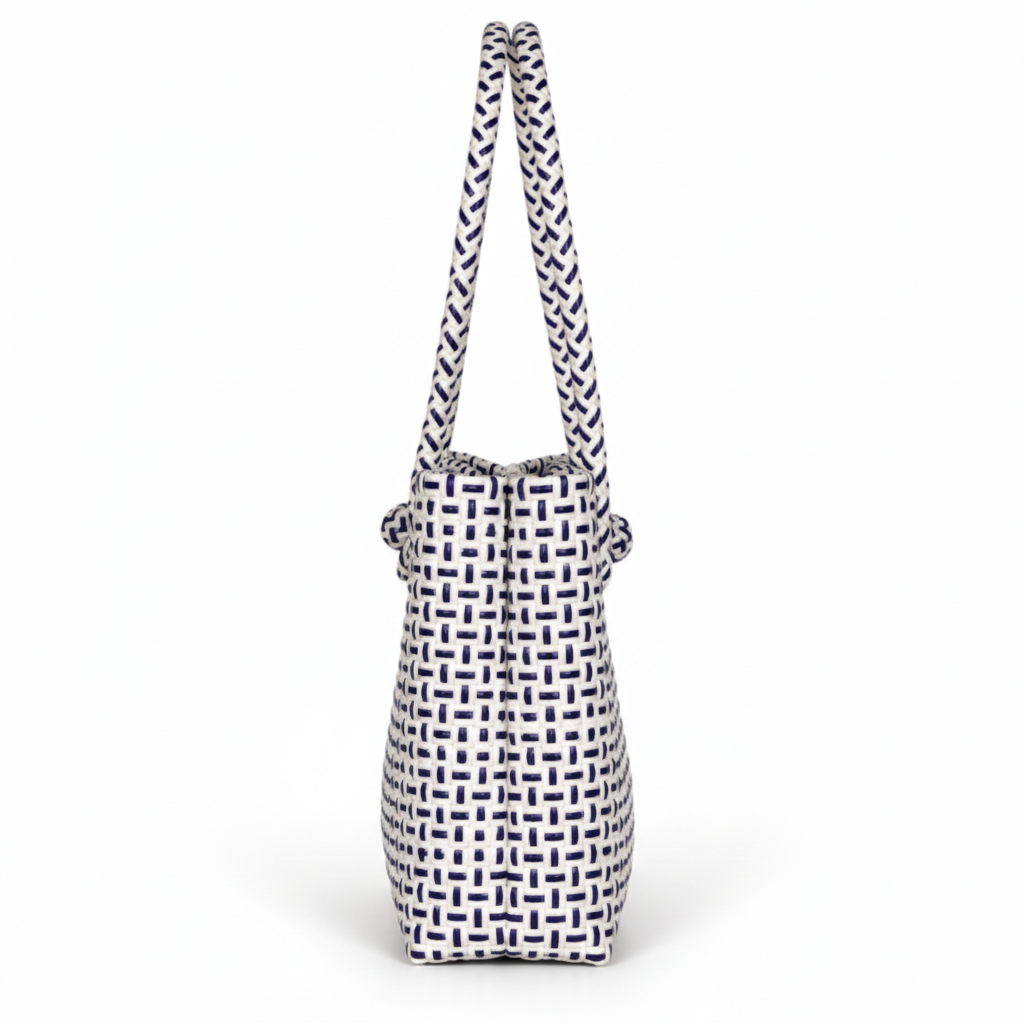 Side profile of the black and white handwoven bag