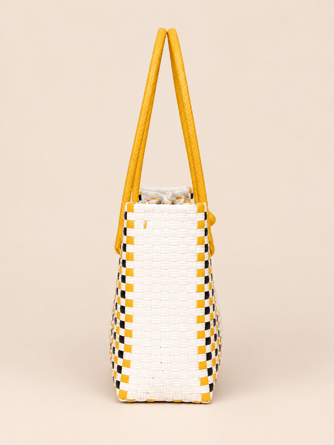 Habi Fiesta recycled-polypropylene structured bayong tote, side view