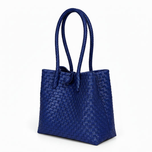 30-degree angle view of the navy blue handwoven bag