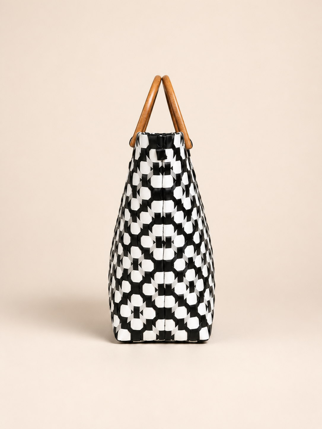 Habi Diwata recycled-polypropylene structured bayong tote, side view