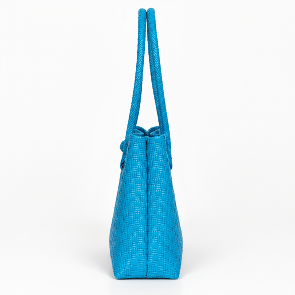 90-degree side profile of the bright blue handwoven bag