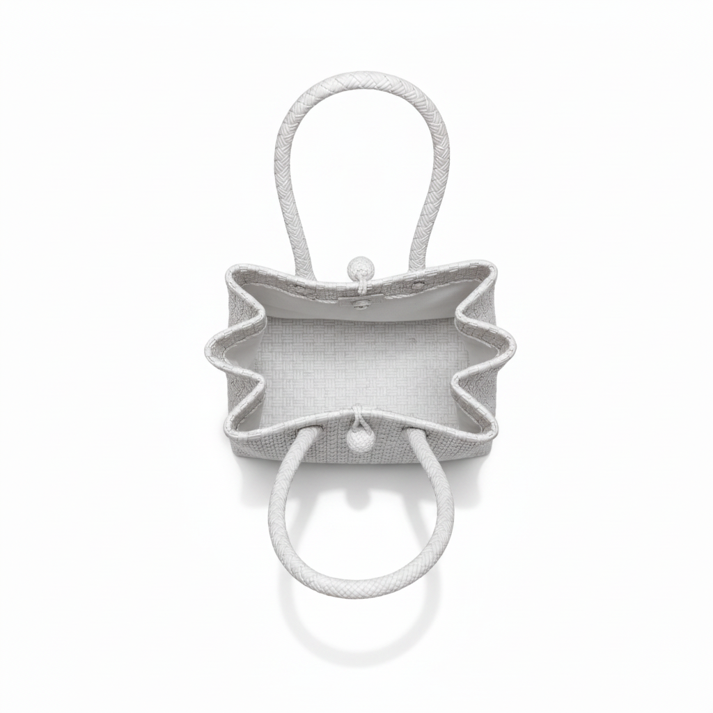 Aerial top-down view of the white handwoven bag