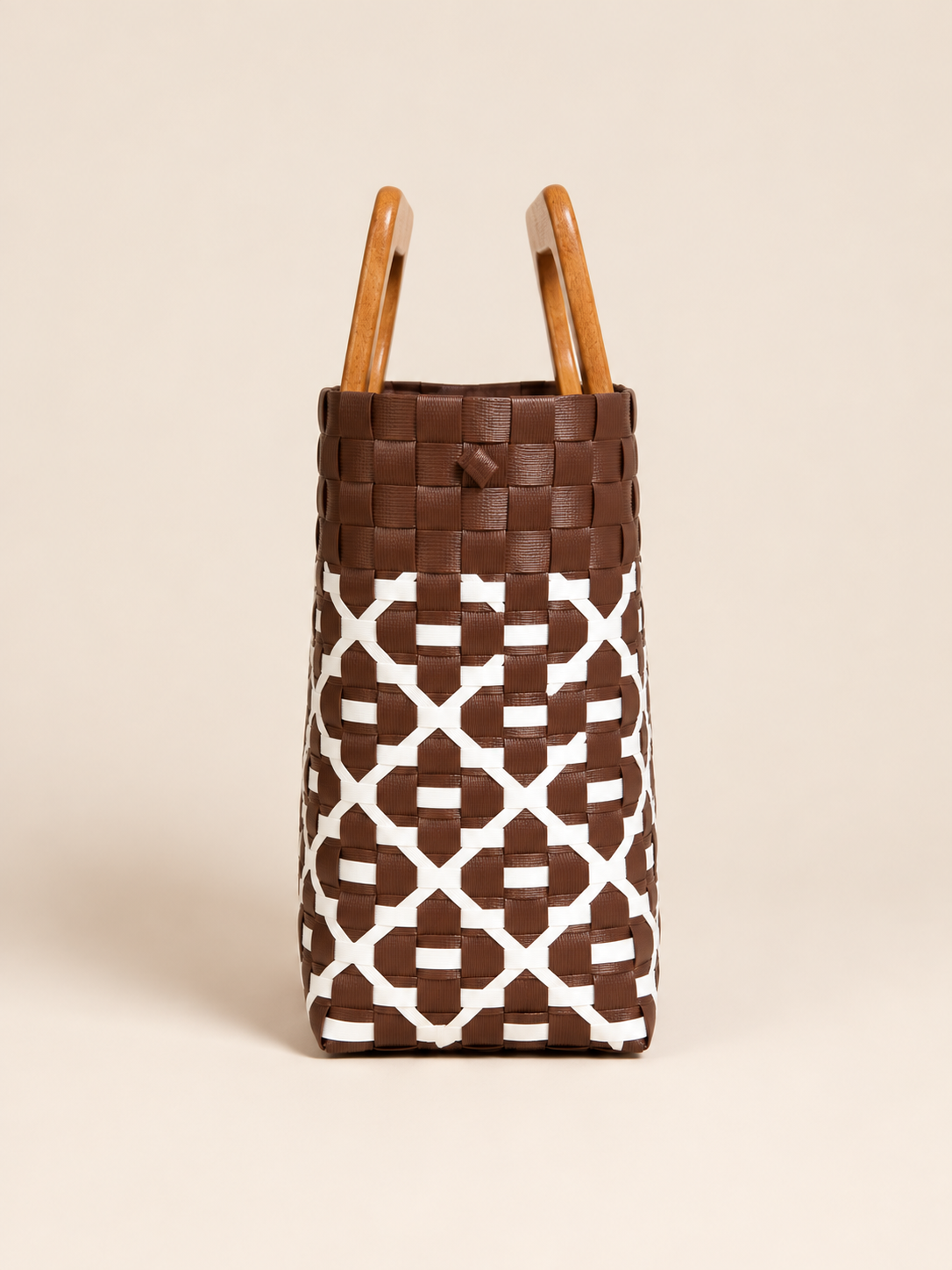 Habi Niyog recycled-polypropylene structured bayong tote, side view