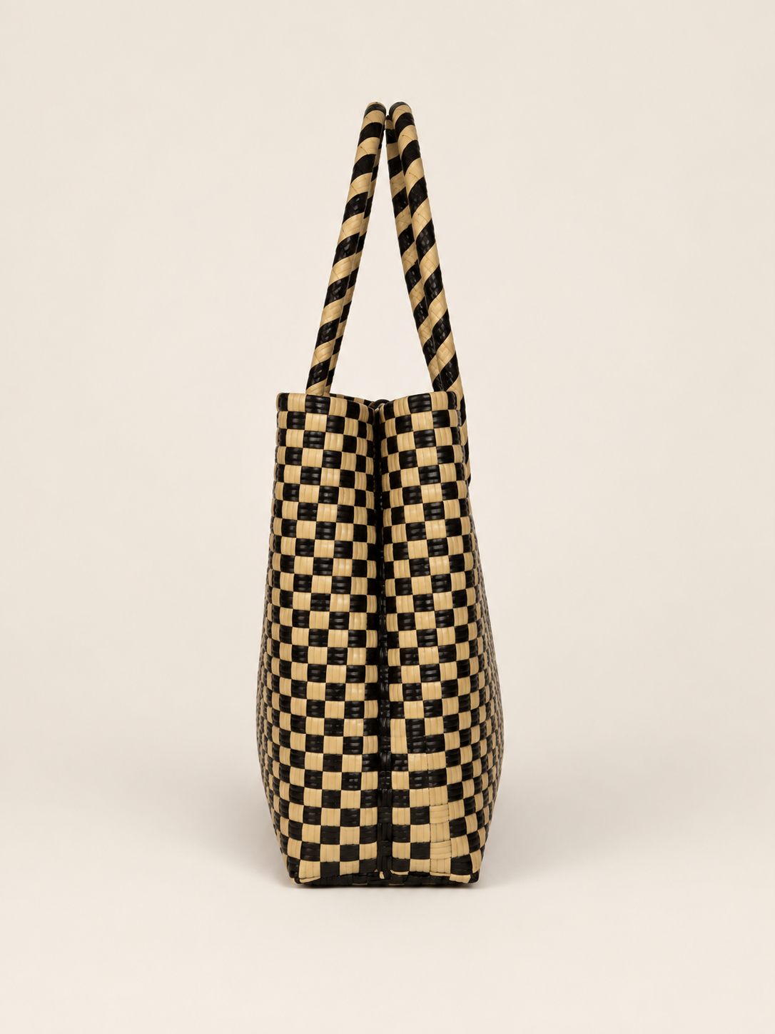Habi Ginto — Malaki recycled-polypropylene structured bayong tote, side view