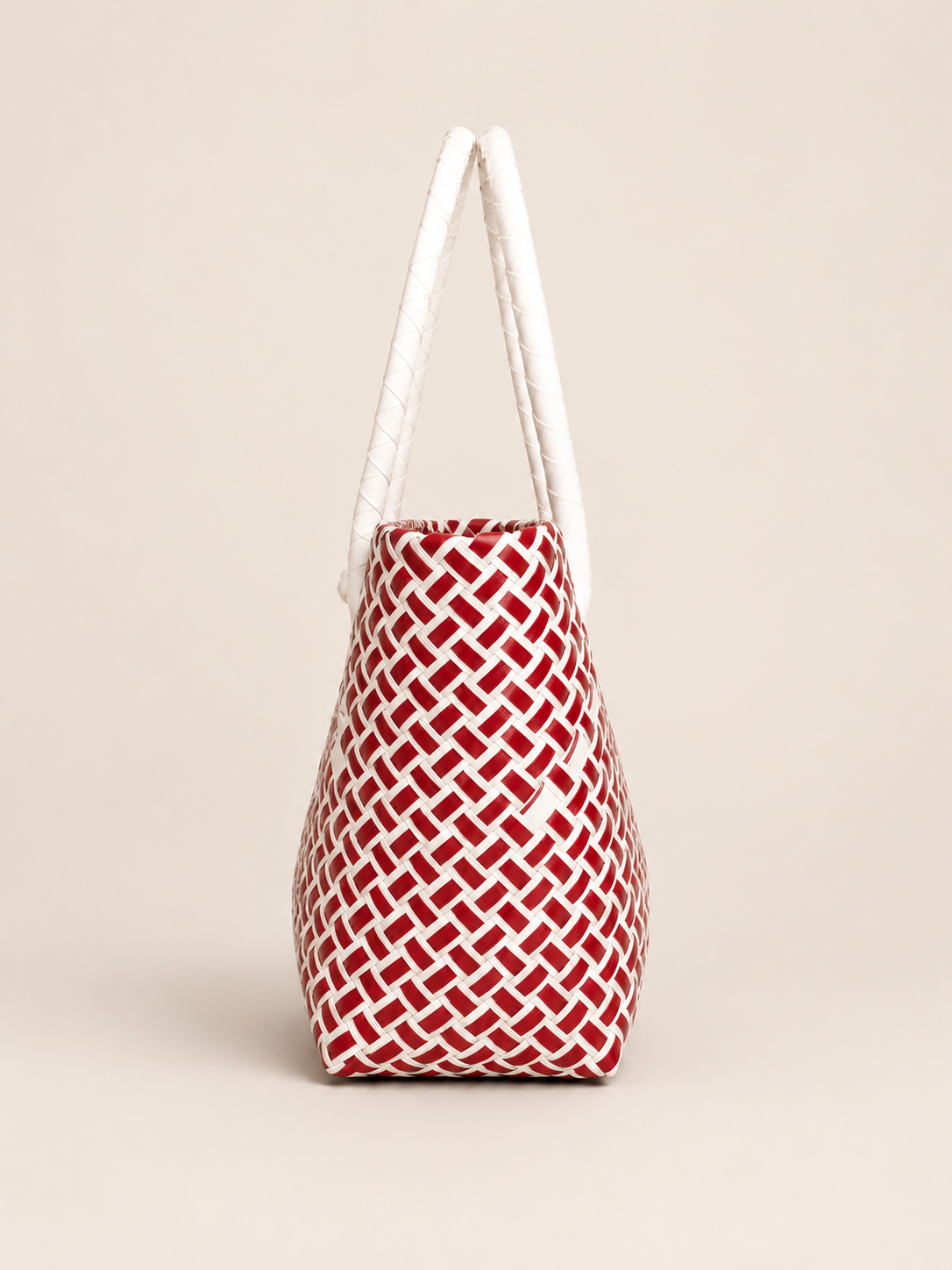 Habi Rosas — Pula at Puti recycled-polypropylene structured bayong tote, side view