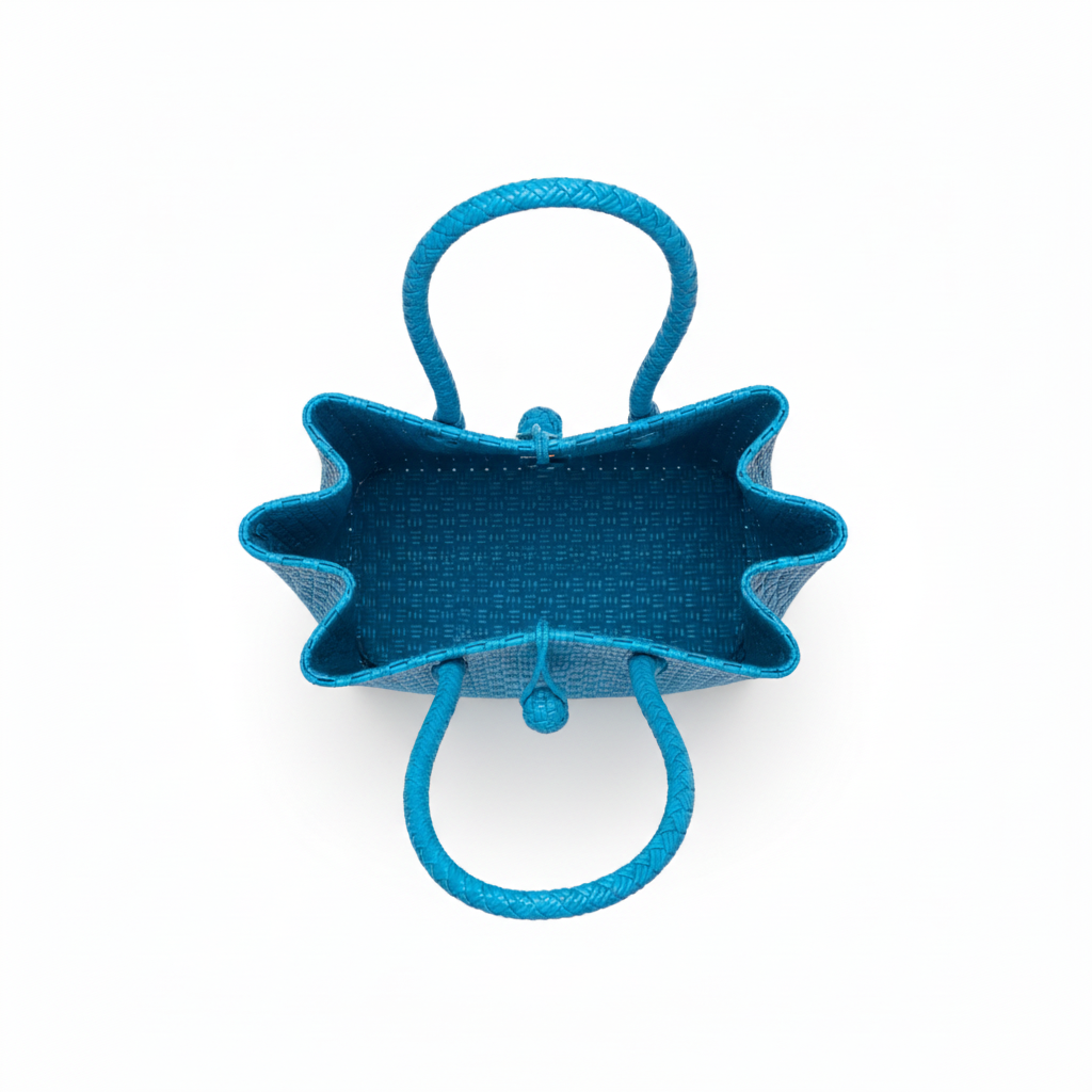 Aerial top-down view of the bright blue handwoven bag