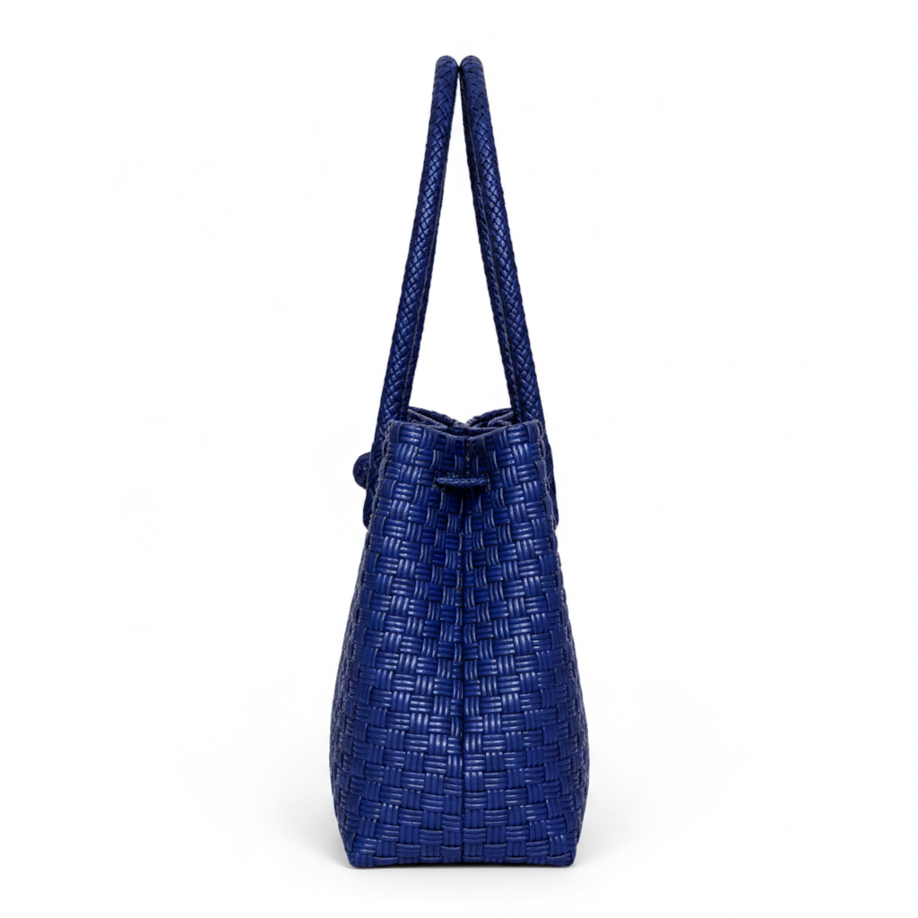 90-degree side profile of the navy blue handwoven bag