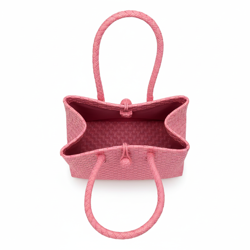 Aerial top-down view of the pink handwoven bag