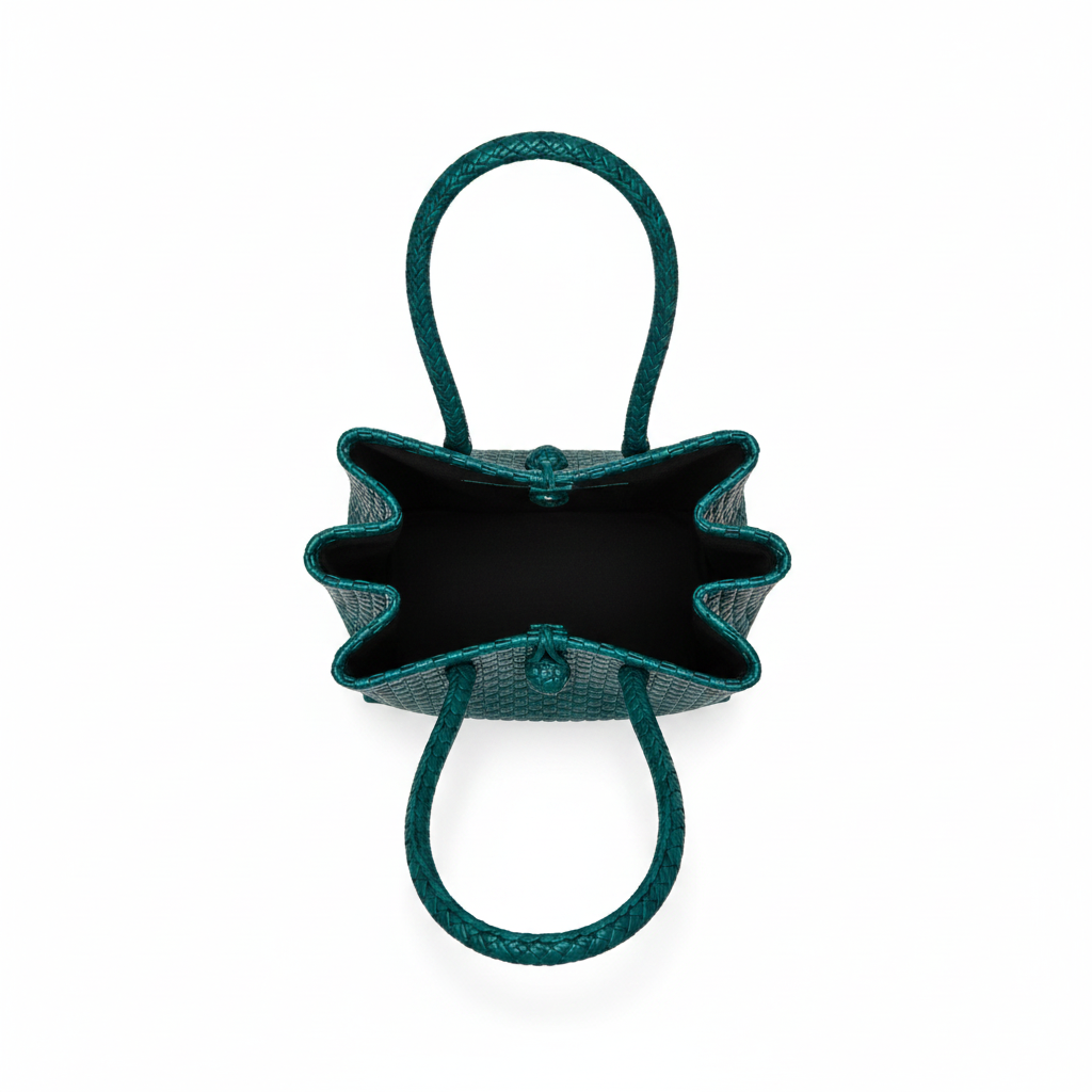 Aerial top-down view of the deep teal handwoven bag