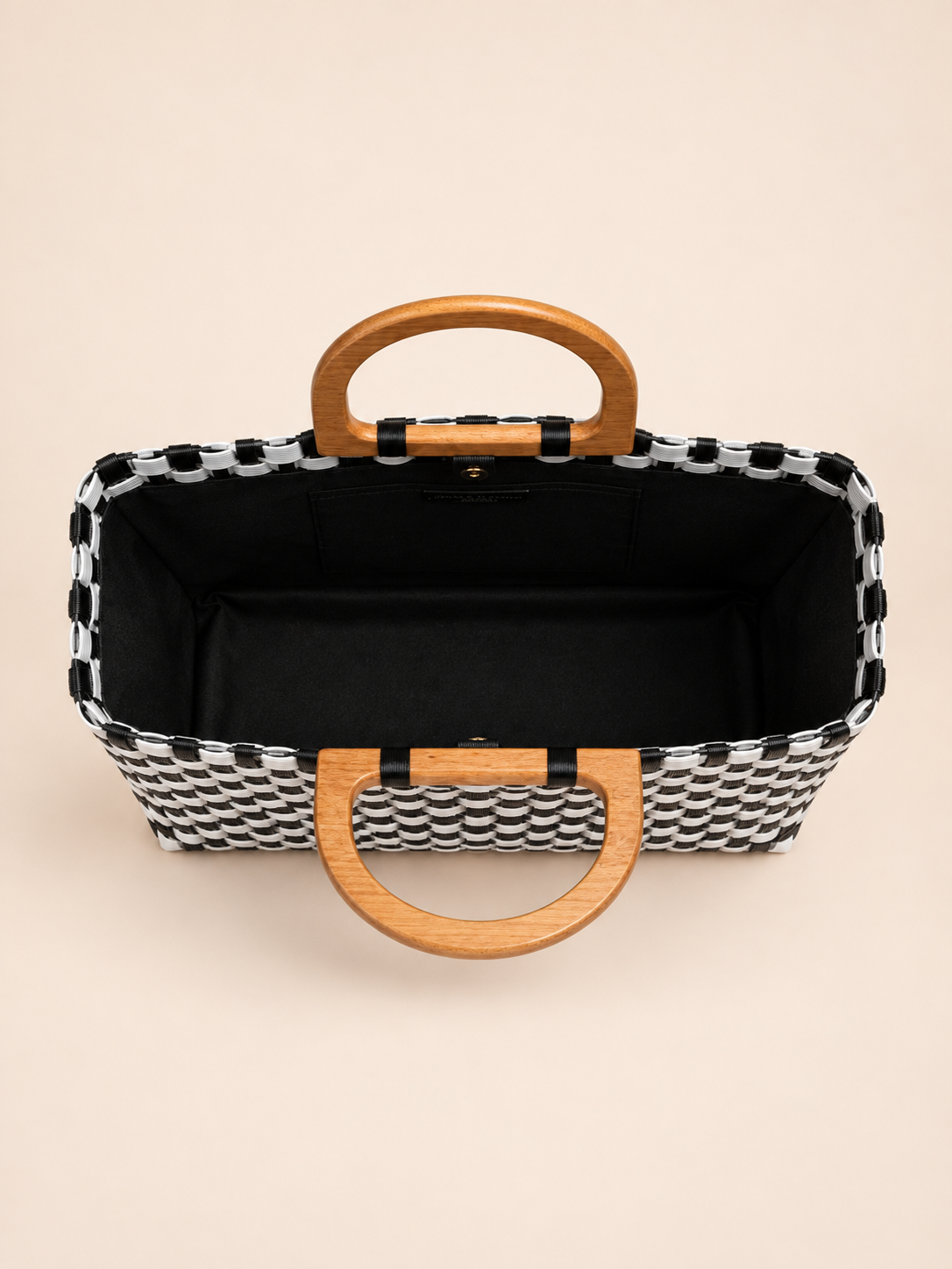 Habi Diwata recycled-polypropylene structured bayong tote, interior view