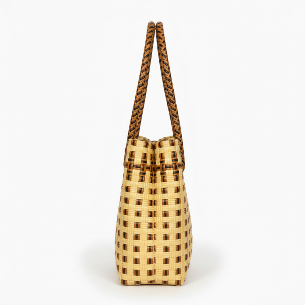 Side profile of the natural tan open-weave handwoven bag