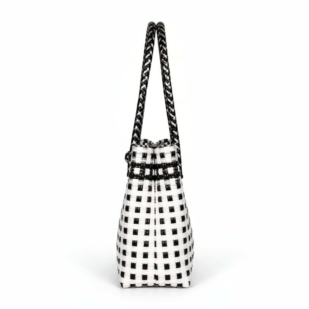 90-degree side profile of the black and white handwoven bag