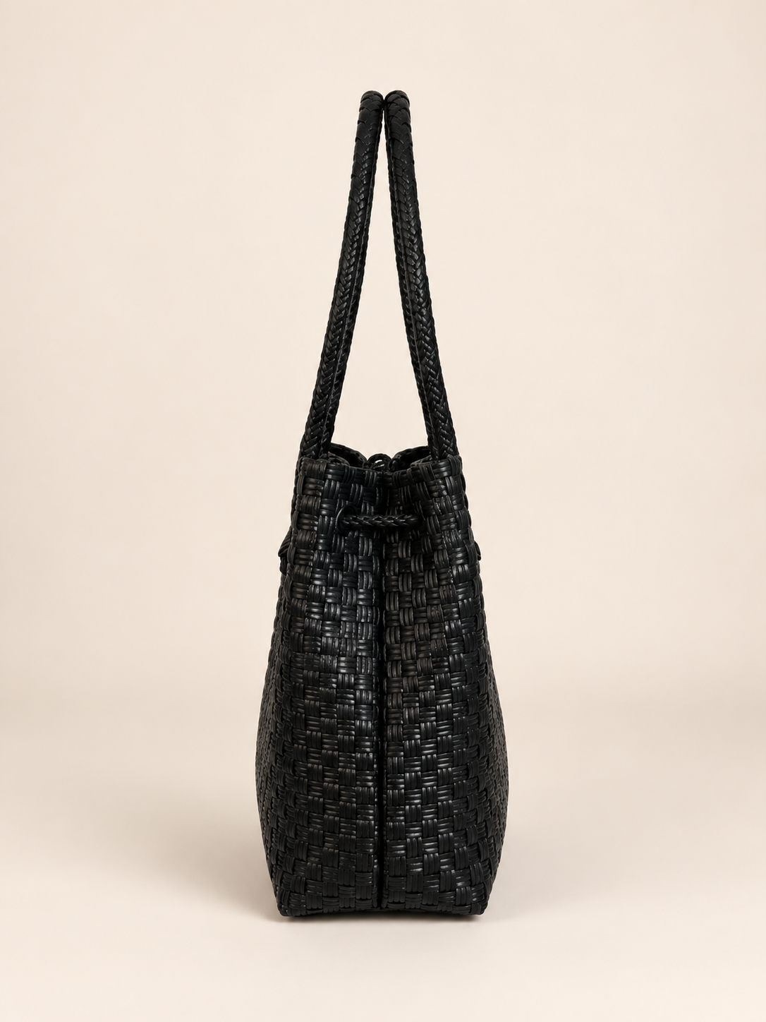 Habi Dilim recycled-polypropylene structured bayong tote, side view