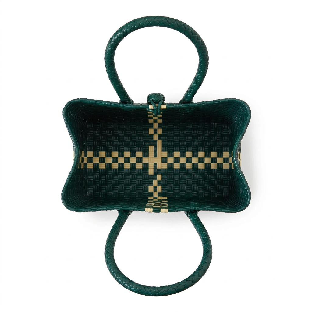 Gubat dark forest green woven compact tote, aerial open-top view on white