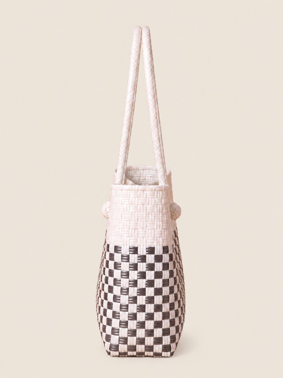 Habi Krema recycled-polypropylene structured bayong tote, side view
