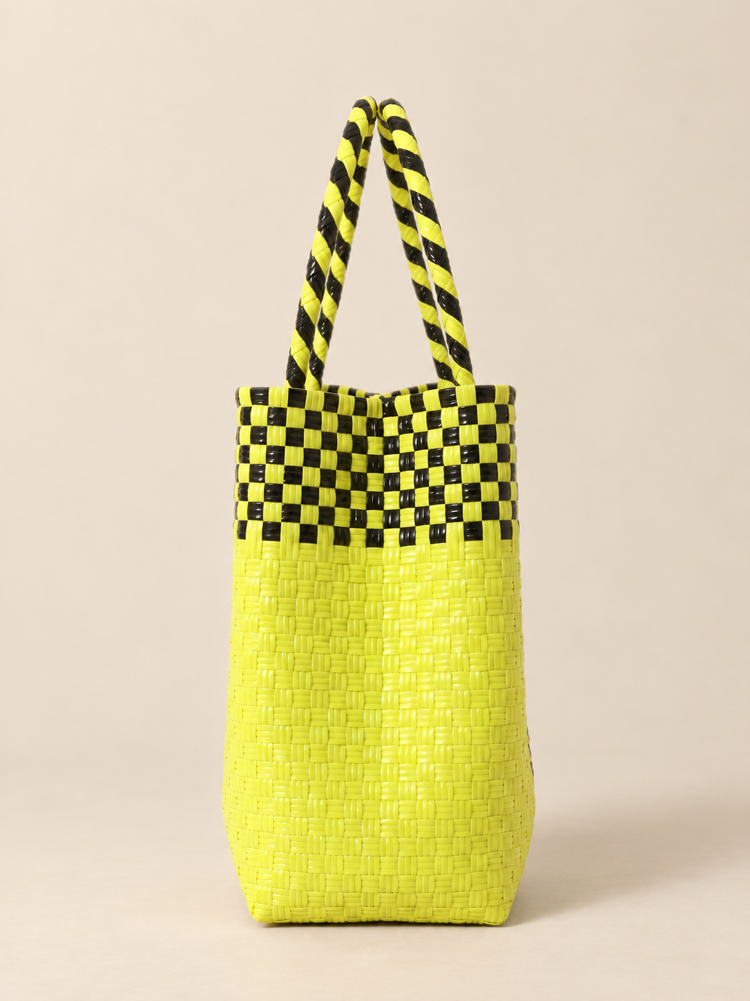 Habi Kidlat recycled-polypropylene structured bayong tote, side view