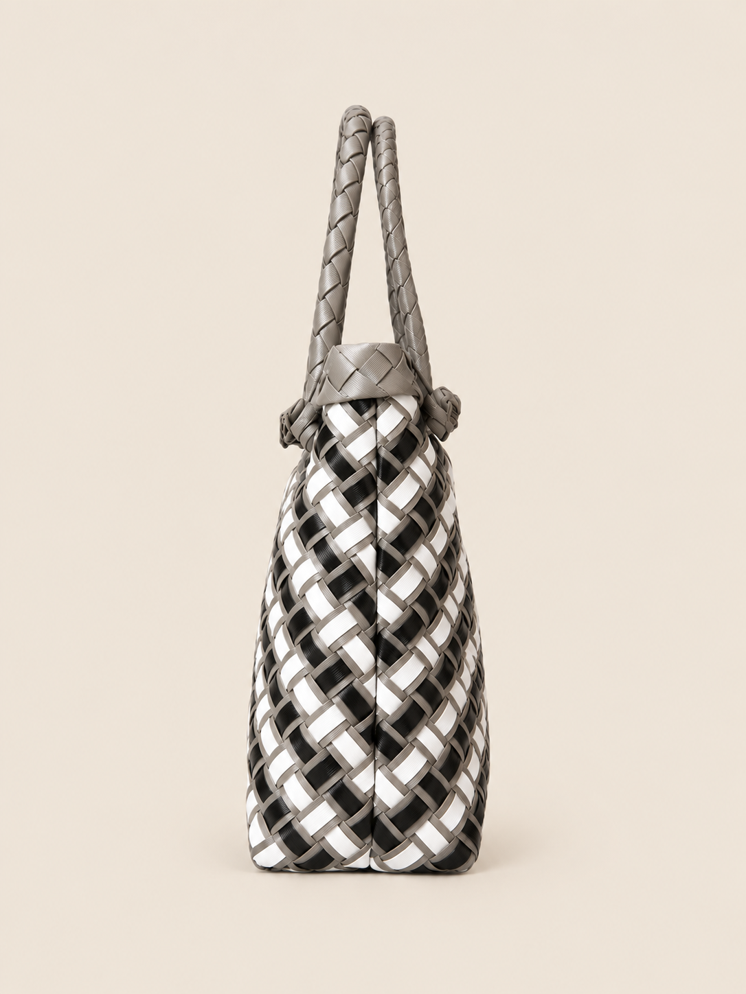 Habi Uling recycled-polypropylene structured bayong tote, side view