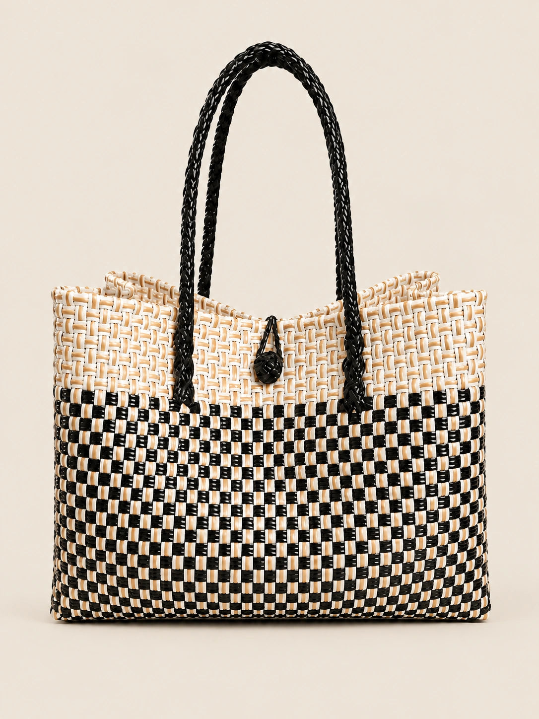 Habi Araw-Gabi recycled-polypropylene structured bayong tote, front view