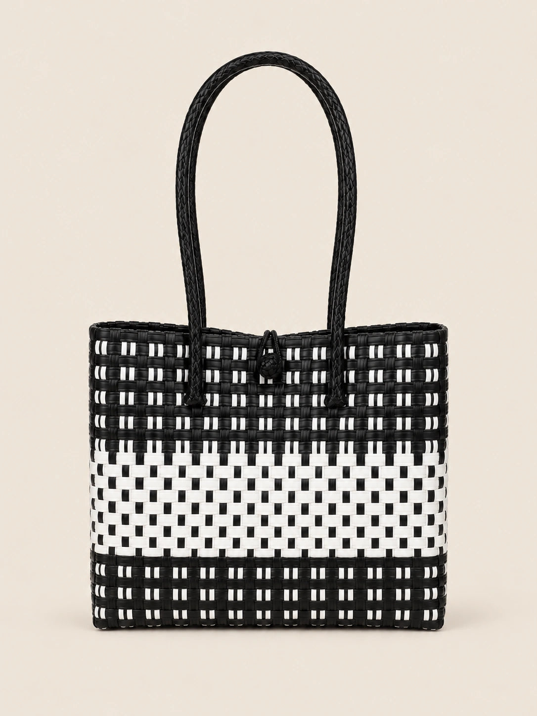 Habi Itim-Puti recycled-polypropylene structured bayong tote, front view