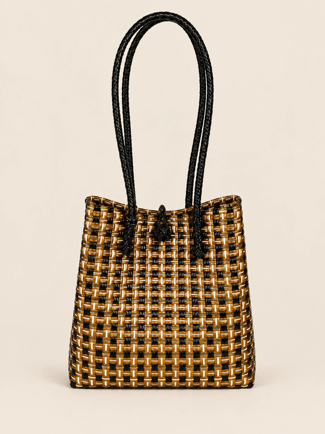 Habi Kayamanan recycled-polypropylene structured bayong tote, back view