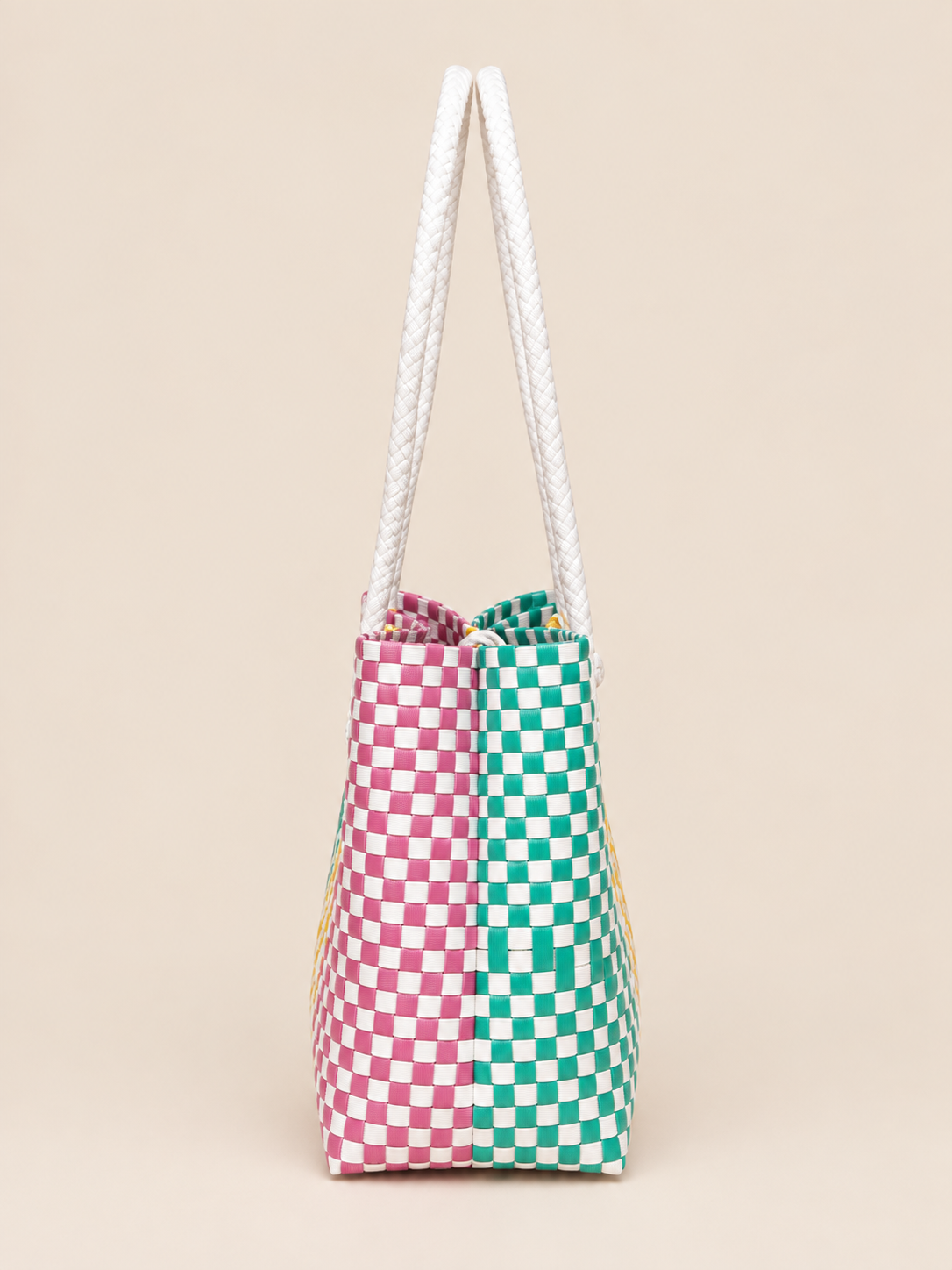 Habi Tatluhan recycled-polypropylene structured bayong tote, side view