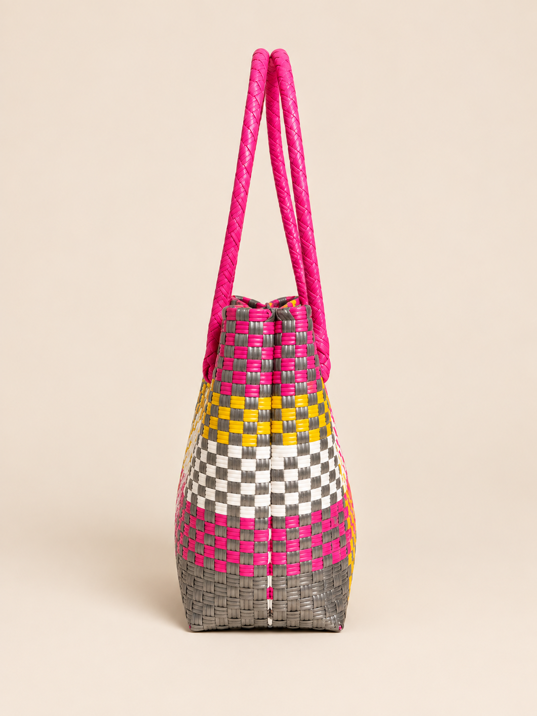 Habi Pista — Tagpi recycled-polypropylene structured bayong tote, side view
