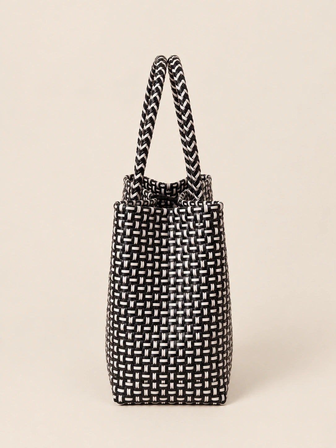Habi Abo recycled-polypropylene structured bayong tote, side view