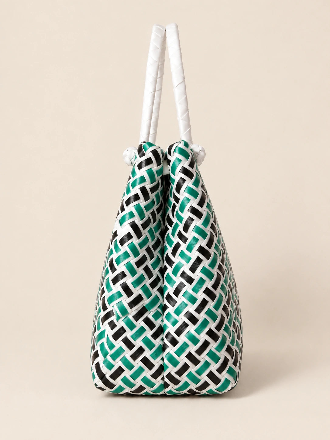Habi Gubat recycled-polypropylene structured bayong tote, side view