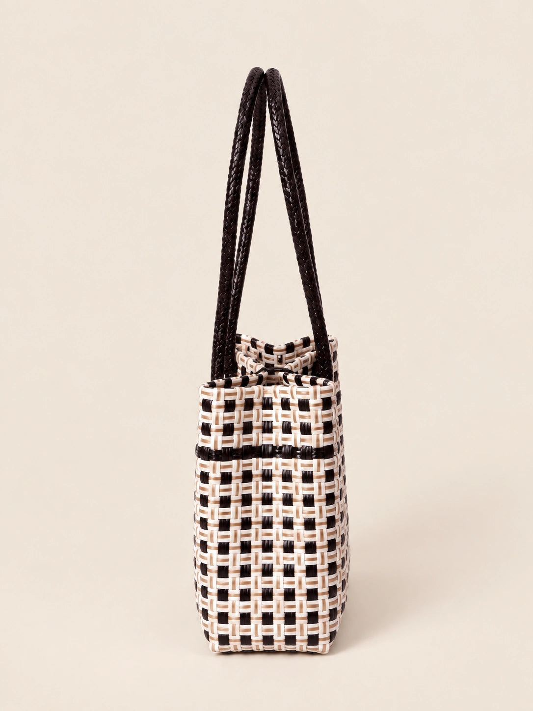 Habi Damero recycled-polypropylene structured bayong tote, side view