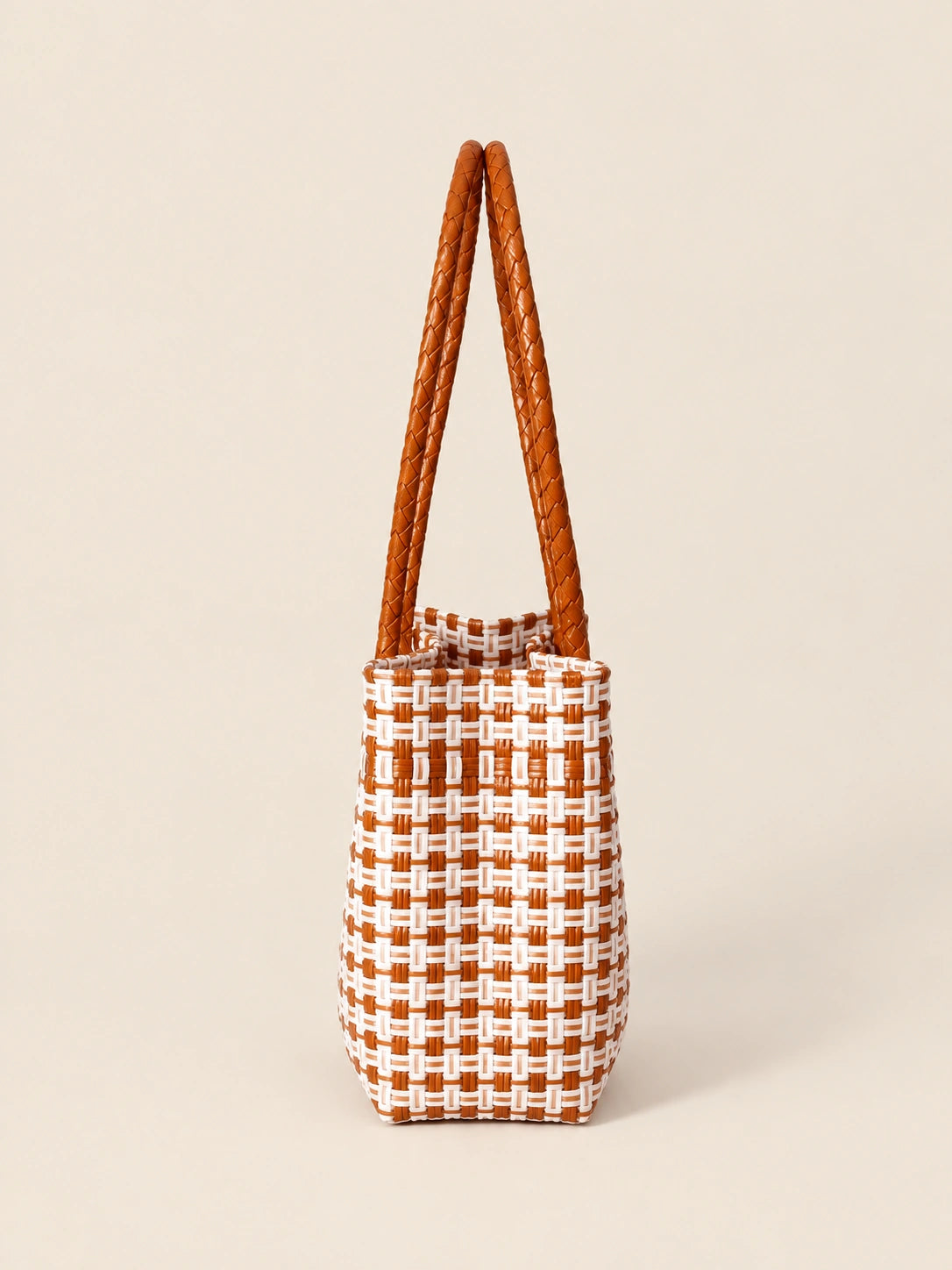 Habi Kape recycled-polypropylene structured bayong tote, side view