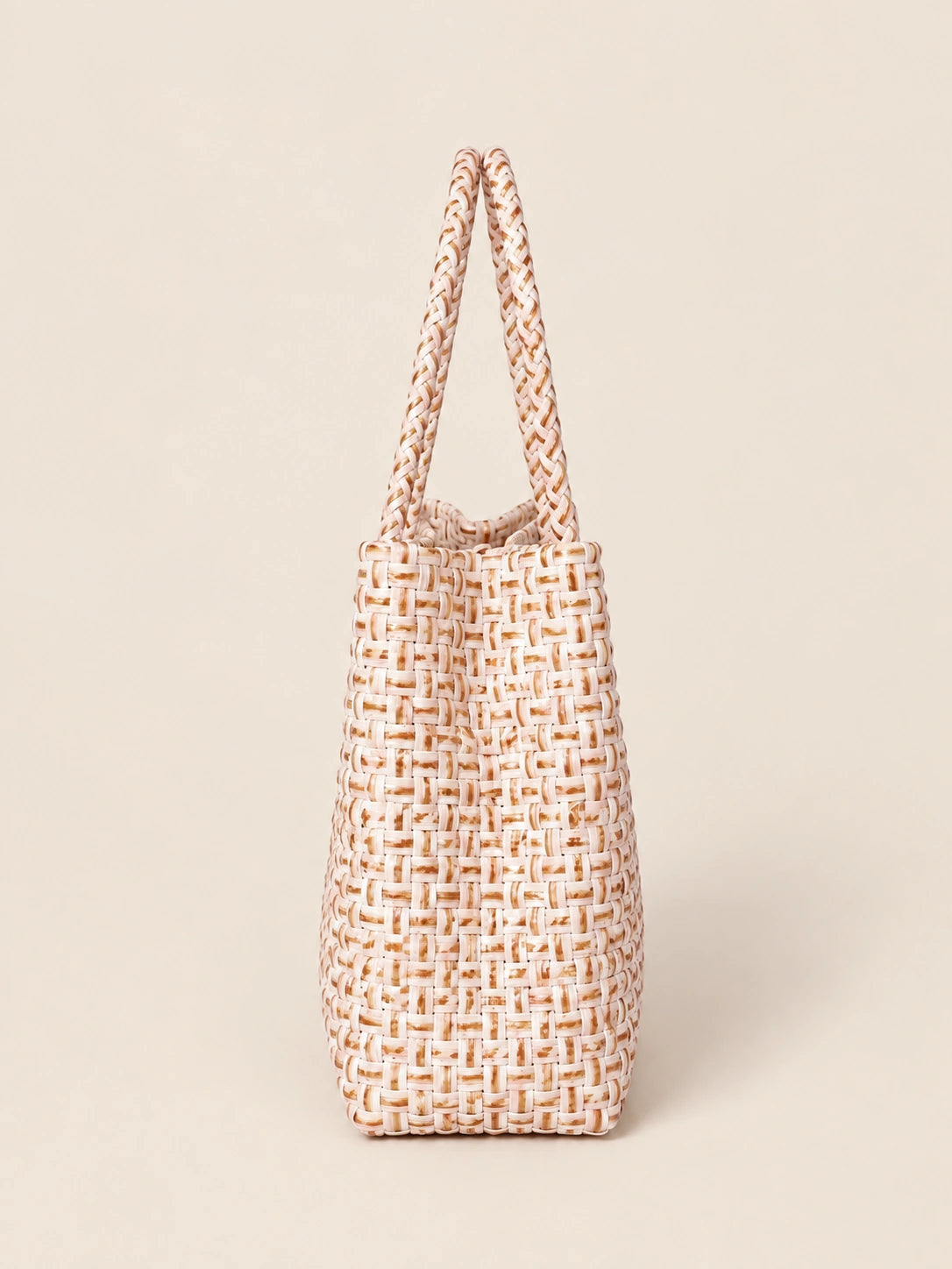 Habi Buhangin recycled-polypropylene structured bayong tote, side view